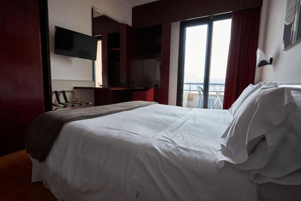 Hotel Concorde Arona Bagian luar foto