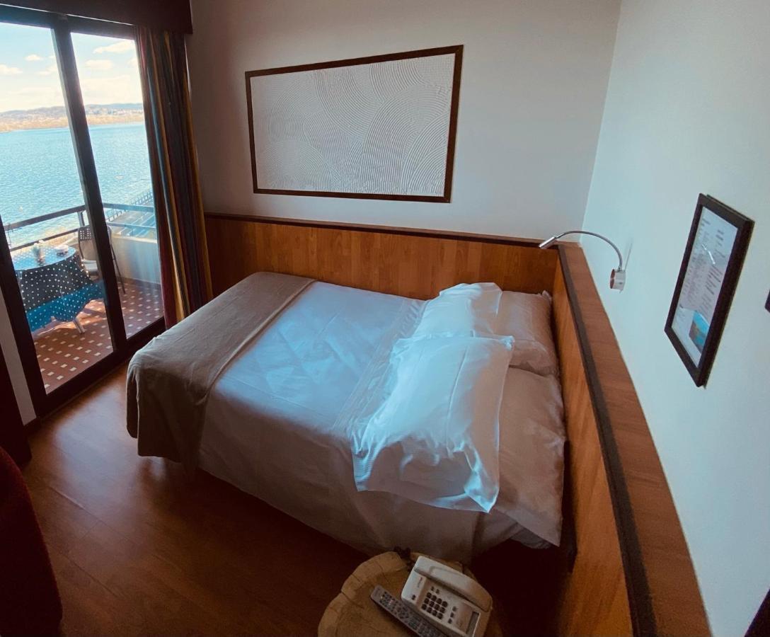 Hotel Concorde Arona Bagian luar foto