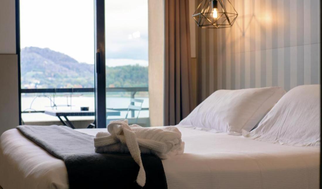 Hotel Concorde Arona Bagian luar foto